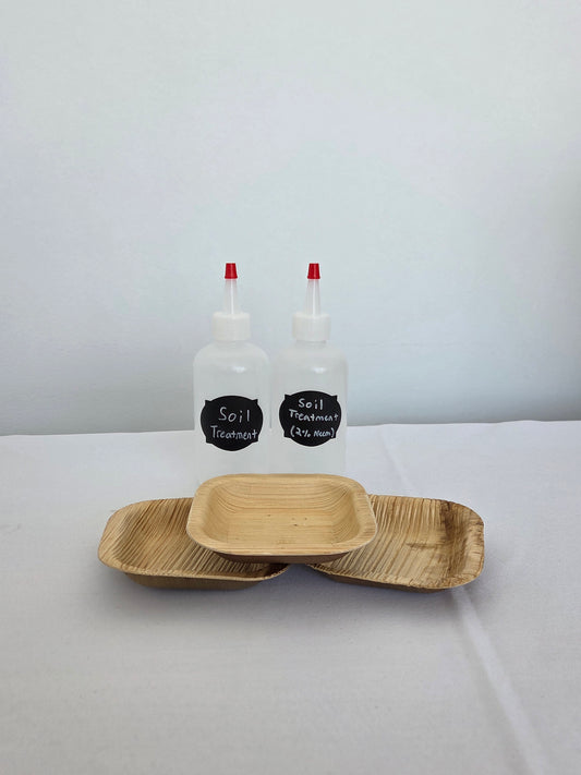 Two soil drench bottles with three bamboo bowls 